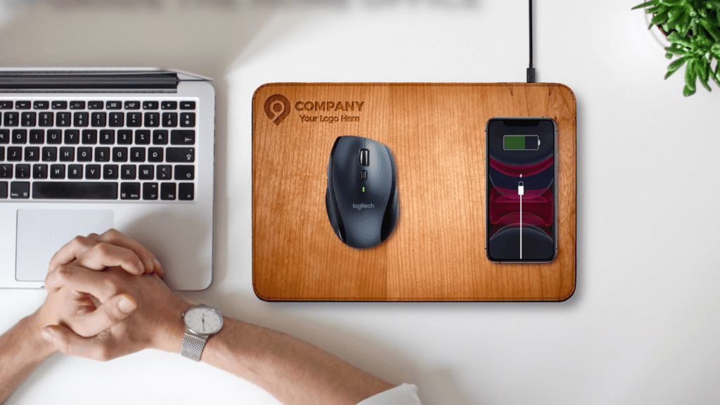This wooden mousepad with built-in wireless charger makes a great employee Christmas gift